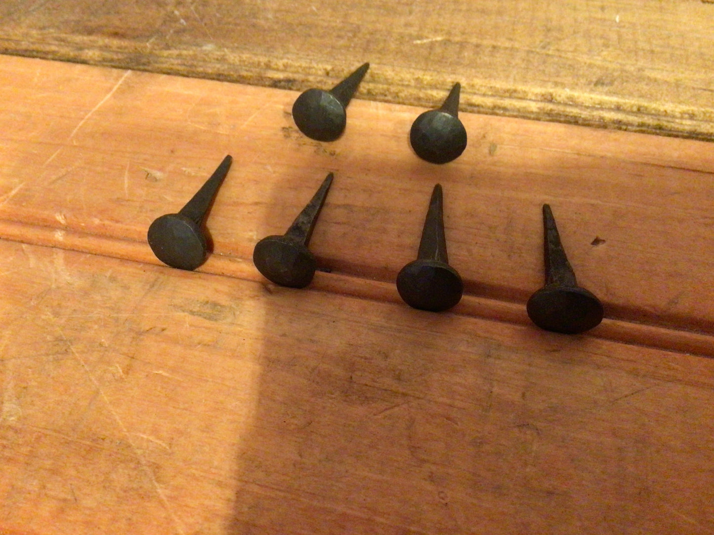 Set of 6..... 1" Black Hand Forged Nails w/ Round "Dented Heads"